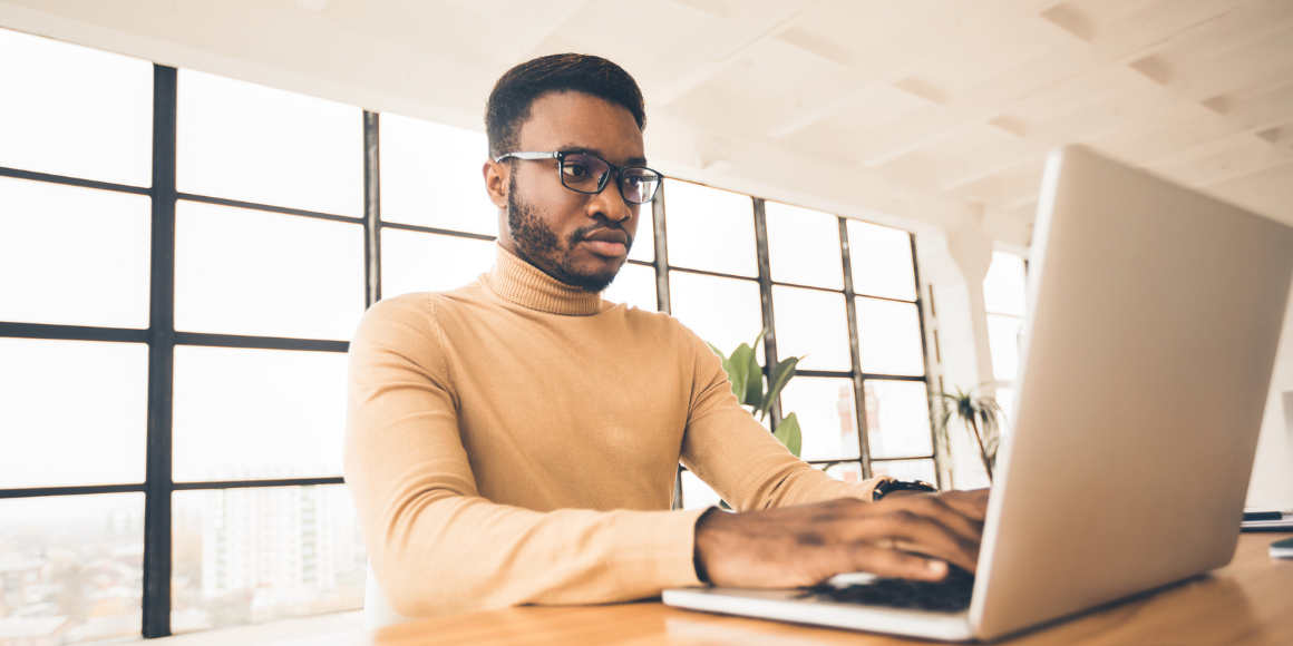 black man on laptop
