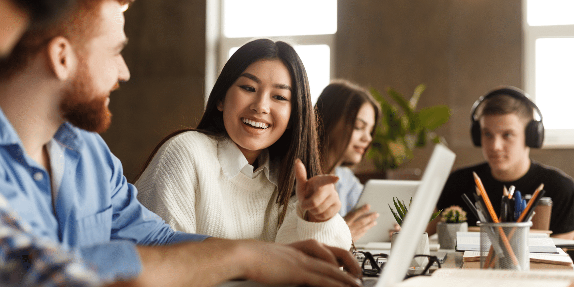 people talking while sitting near computer